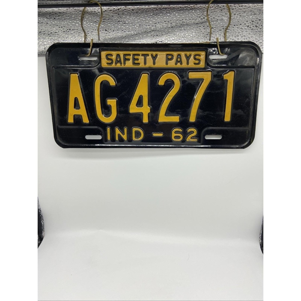 1962 Indiana license plate AG 4271 Safety Pays Black Yellow
